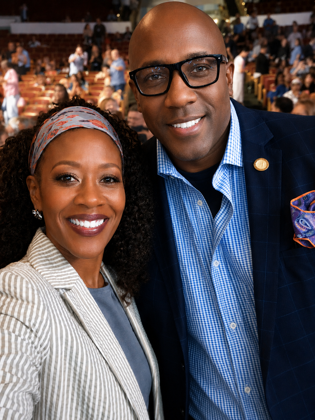 Stacey Love and Marlin Faulkner, founders of Full Circle Legacy Partners, at a stadium.
